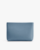 Rectangular clutch bag with smooth texture on white background.
