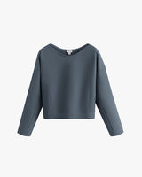 Long-sleeve pullover top on white background.