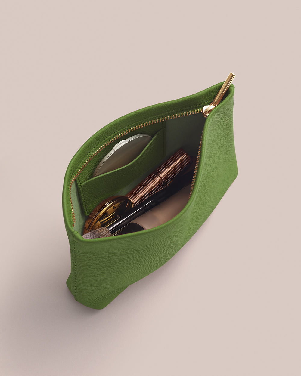 Open pouch with cosmetics inside
