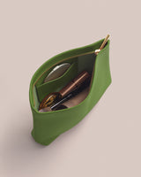 Open pouch with cosmetics inside