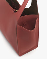 Open tote bag with visible inner pocket and handle.