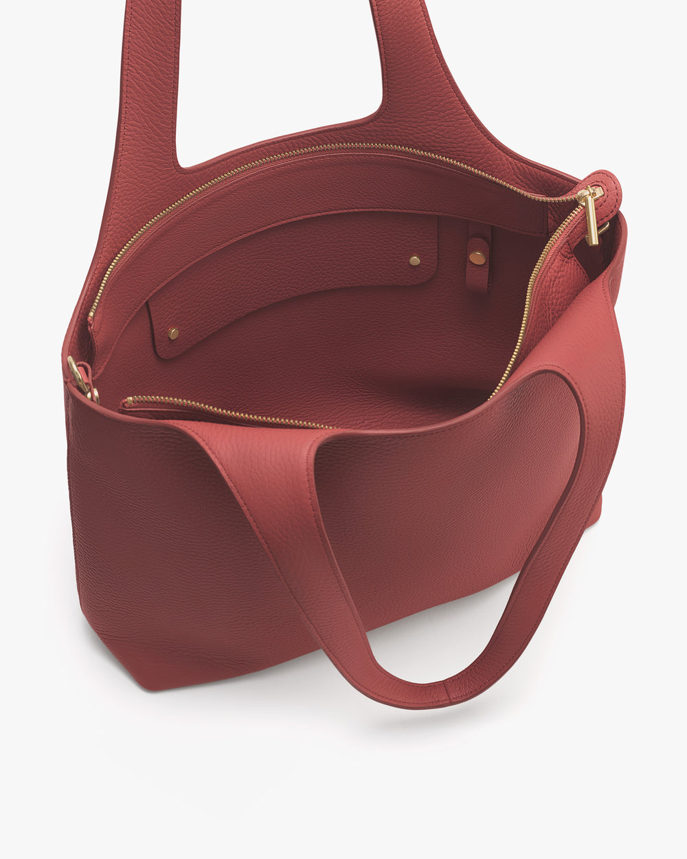 Open handbag with a zipper and inner pocket visible.