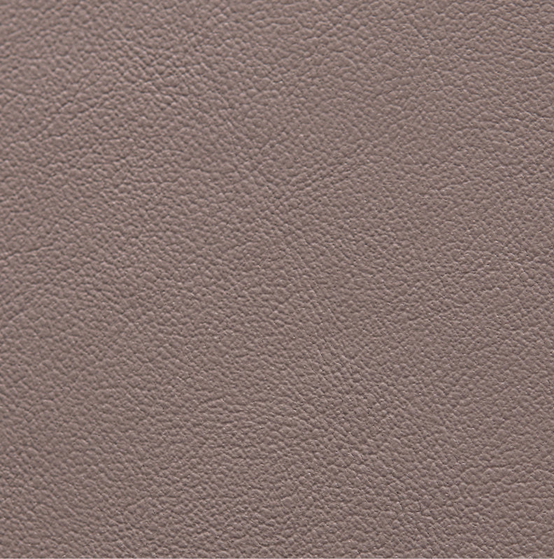 Close-up of leather texture with fine grain detail.