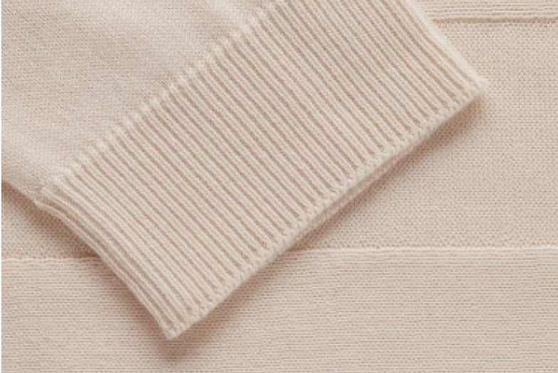 Close-up of a ribbed fabric with a folded edge