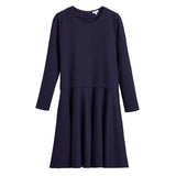 Long-sleeved dress with a round neckline and flared skirt.