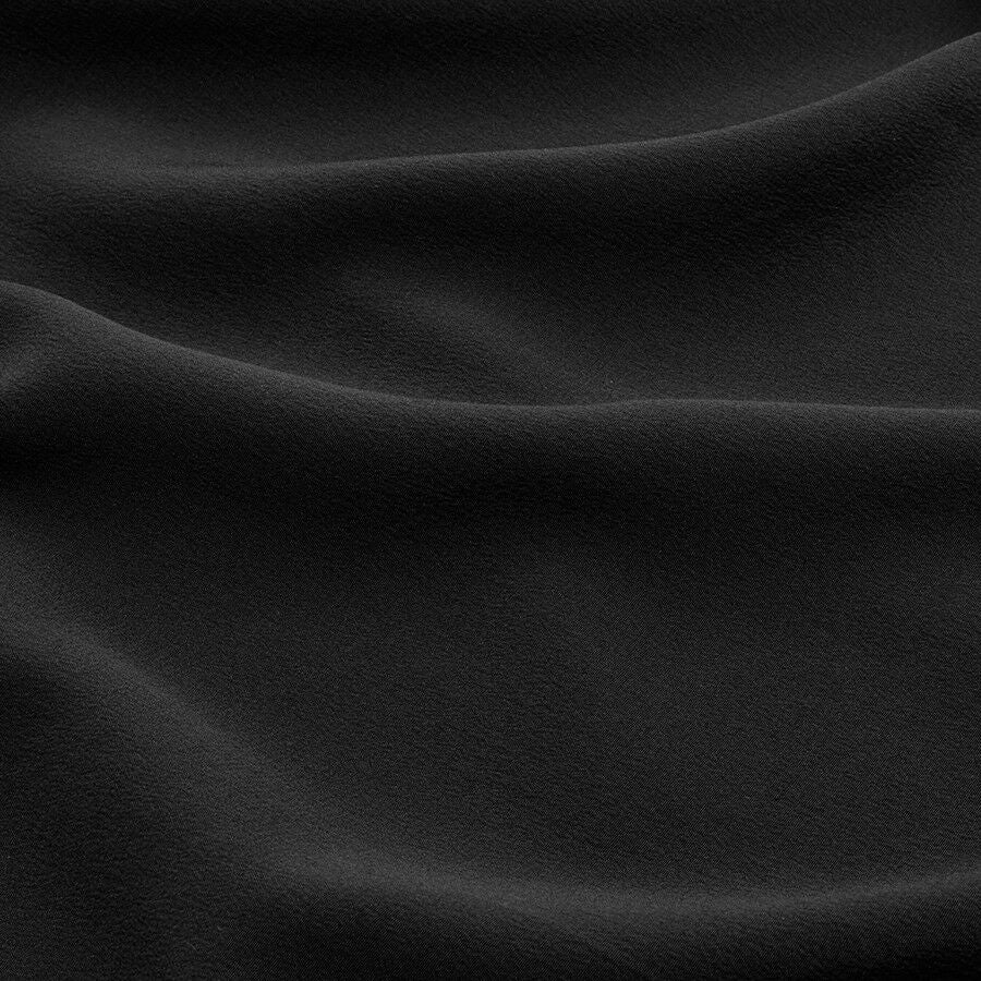 Close-up of wavy textured fabric surface.