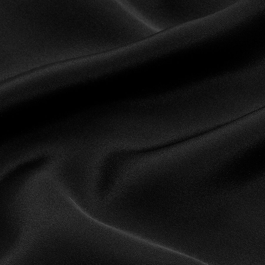 Close-up view of a draped fabric with smooth texture.