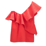 One-shoulder top with ruffle detail.