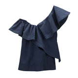 Asymmetric top with one ruffled sleeve.