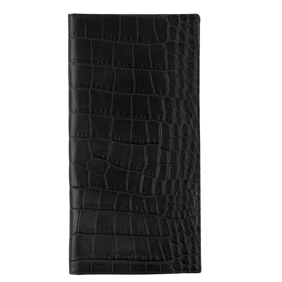 Croc-embossed leather wallet on a plain background.