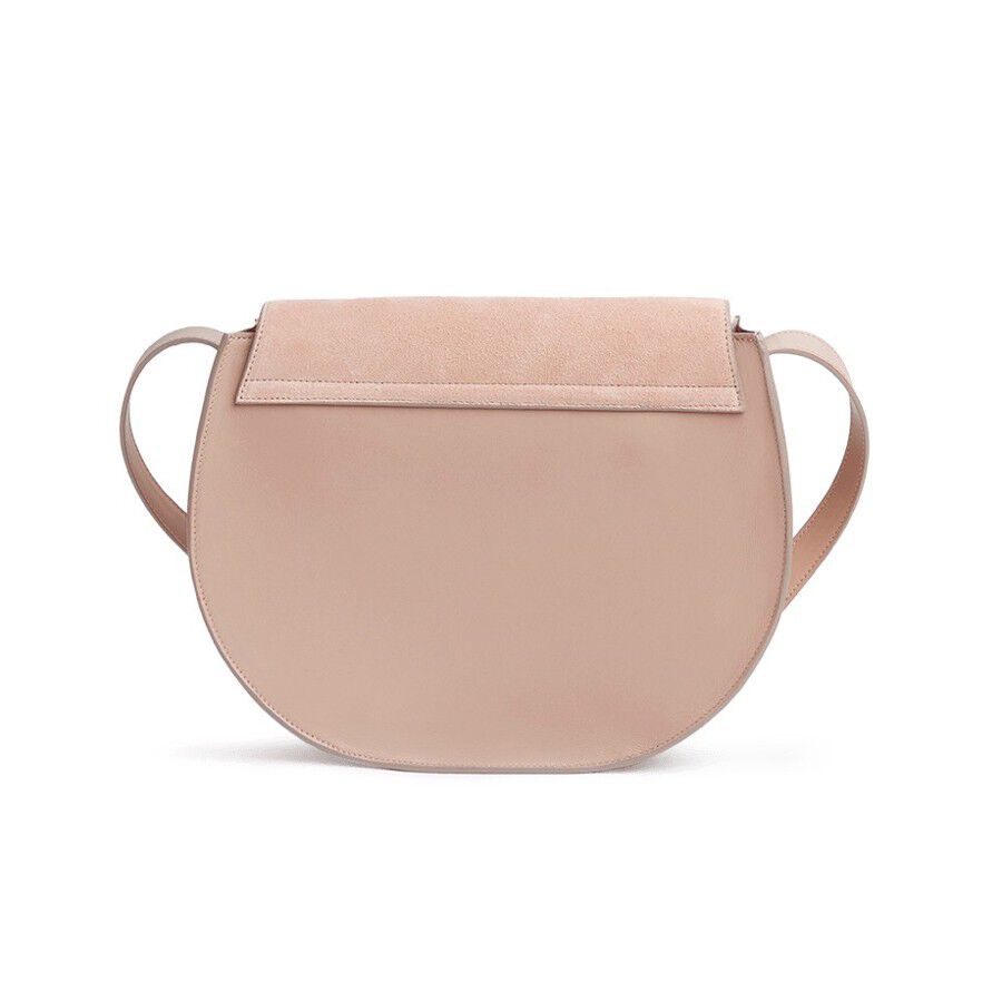 Round handbag with a flap and a shoulder strap.