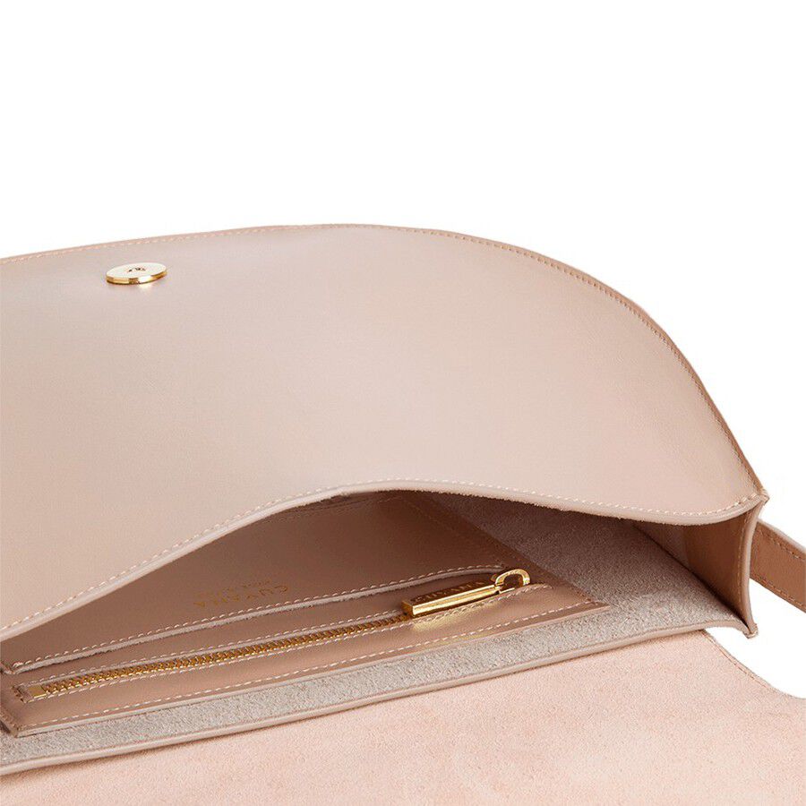 Open purse with visible pen inside.