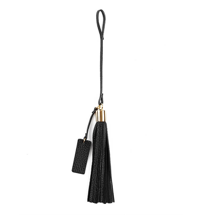 Tassel keychain with strap and rectangular tag.