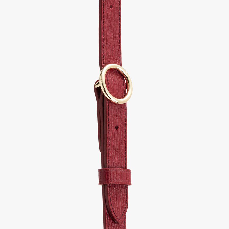 Belt with circular buckle and punched holes