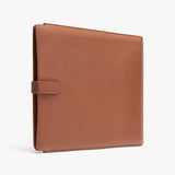 Leather notebook with strap closure