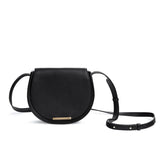 Round shoulder bag with adjustable strap and front clasp.