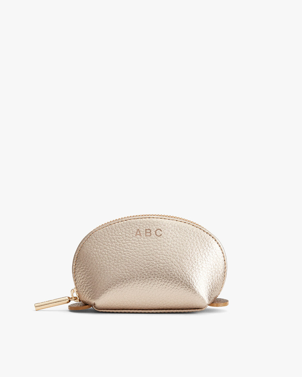 Small pouch with zipper and initials ABC embossed on it.