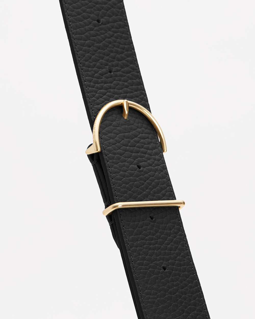 Textured strap with metal buckle