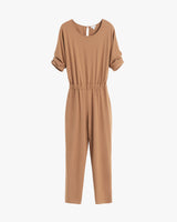 Jumpsuit with short sleeves and an elastic waist on a white background.