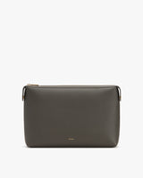 Rectangular purse with a zipper and brand name on the front.