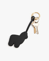 Keychain with alpaca shape attached to a key set.