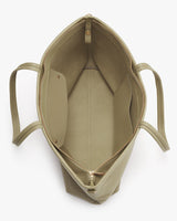 Open backpack showing internal compartments and a top zipper.