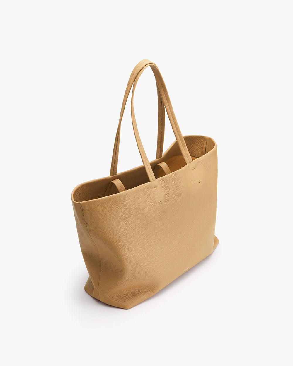 Tote bag with two handles standing upright against a plain background.