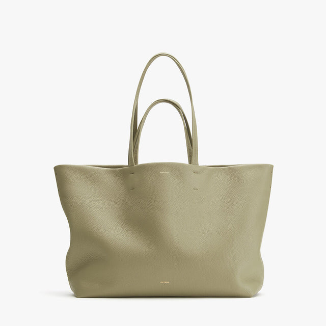 Large tote bag with two handles standing upright.