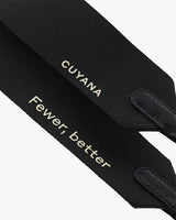 Close-up of a strap with branded text embroidery.