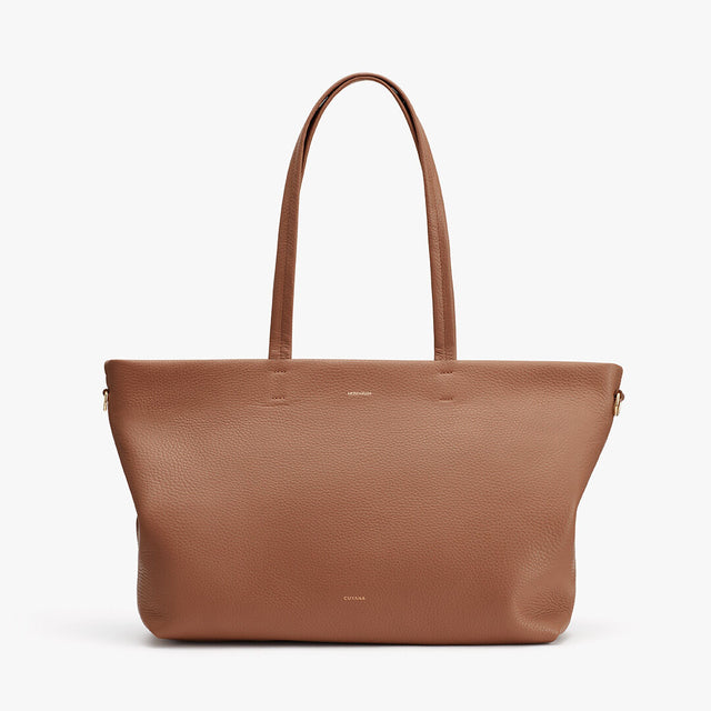 Leather tote bag on a white background