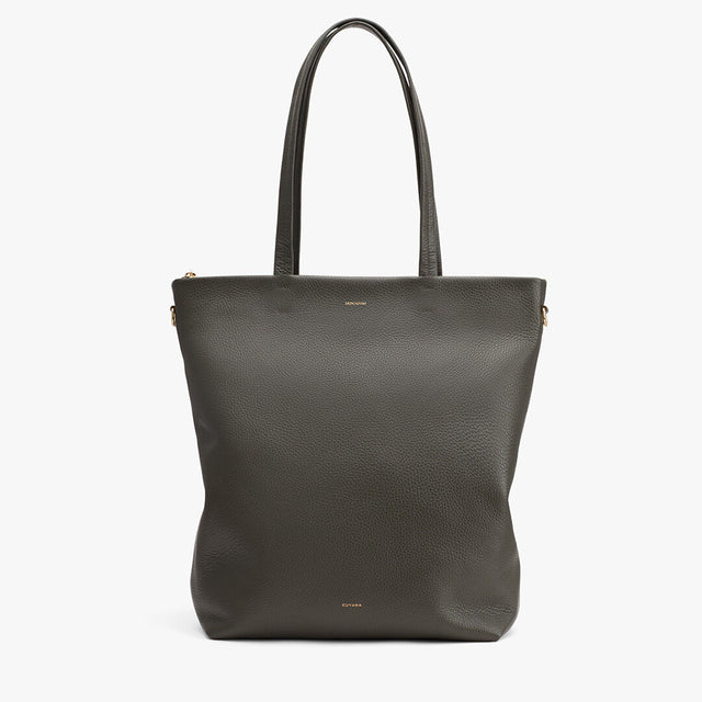 Tote bag standing upright with two handles.