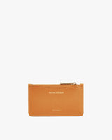 Small zippered pouch with branded text on front.