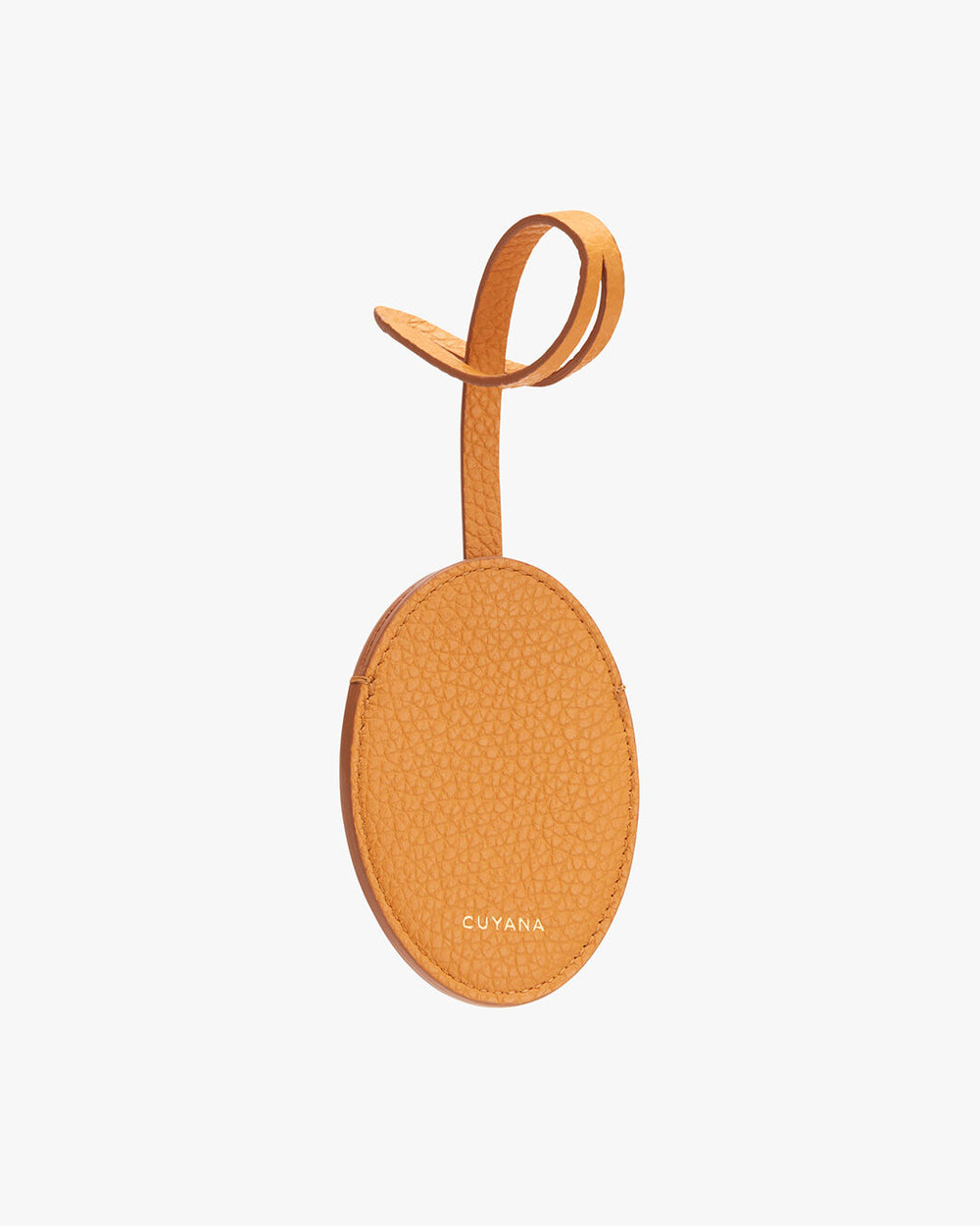 Oval-shaped tag with loop and branded text.