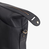 Close-up of a backpack with main compartment and zipper detail.