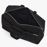 Travel bag with side pockets and top zipper