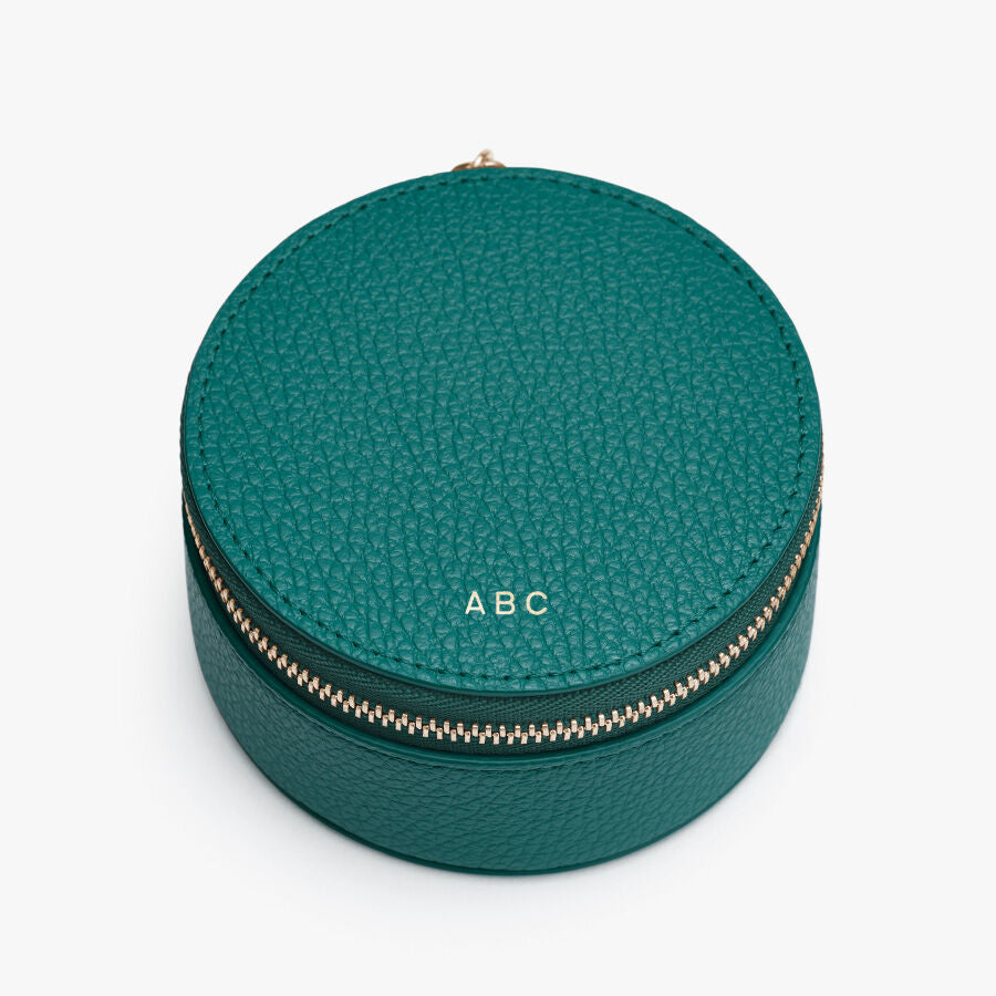 Round case with zipper and initials ABC on top