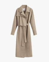 Long belted trench coat with wide lapels displayed on a plain background.