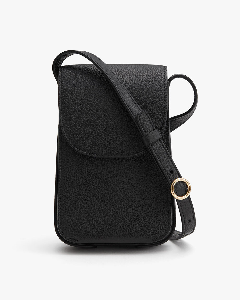 Small textured shoulder bag with a flap and circular metallic detail.