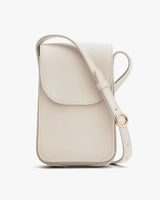 Small purse with front flap and shoulder strap