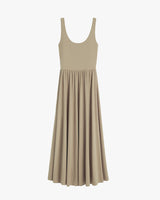 Sleeveless dress with a fitted top and flowing skirt.