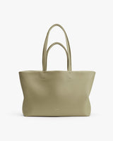 Large tote bag with two handles standing upright.