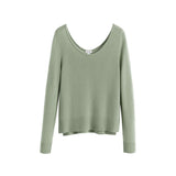 Long-sleeve sweater with a crew neckline on a plain background.