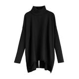 Turtleneck sweater with long sleeves and an asymmetrical hem.