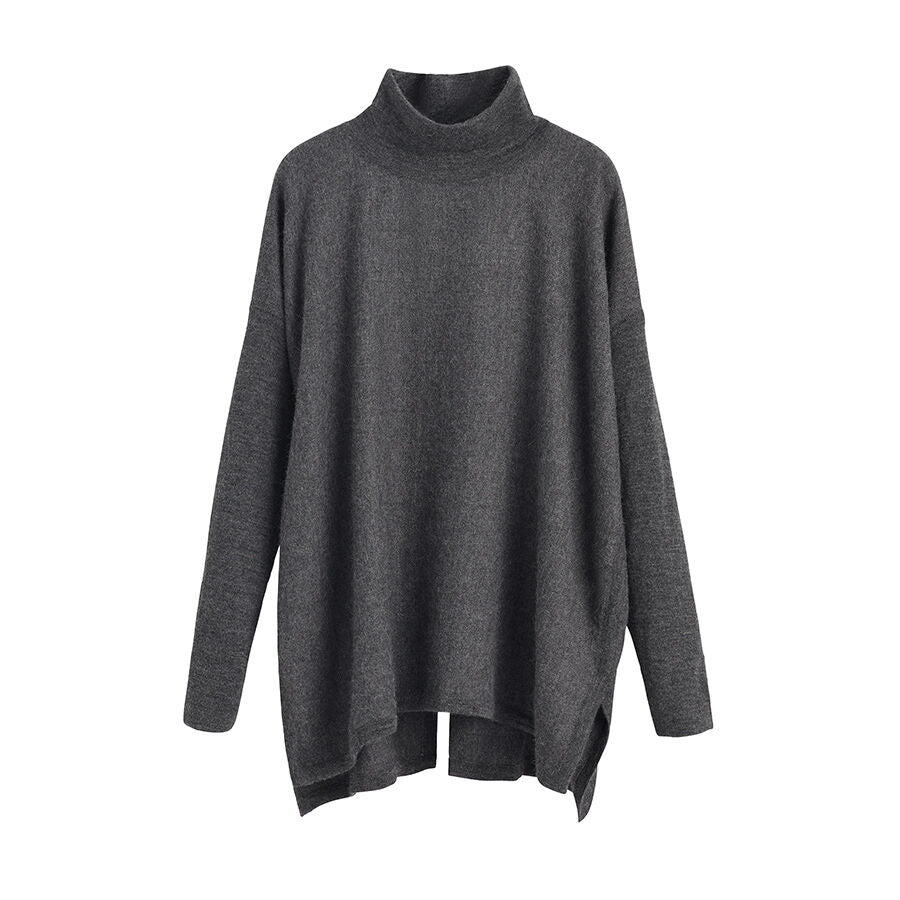 Turtleneck sweater with long sleeves and an uneven hem displayed on a plain background.