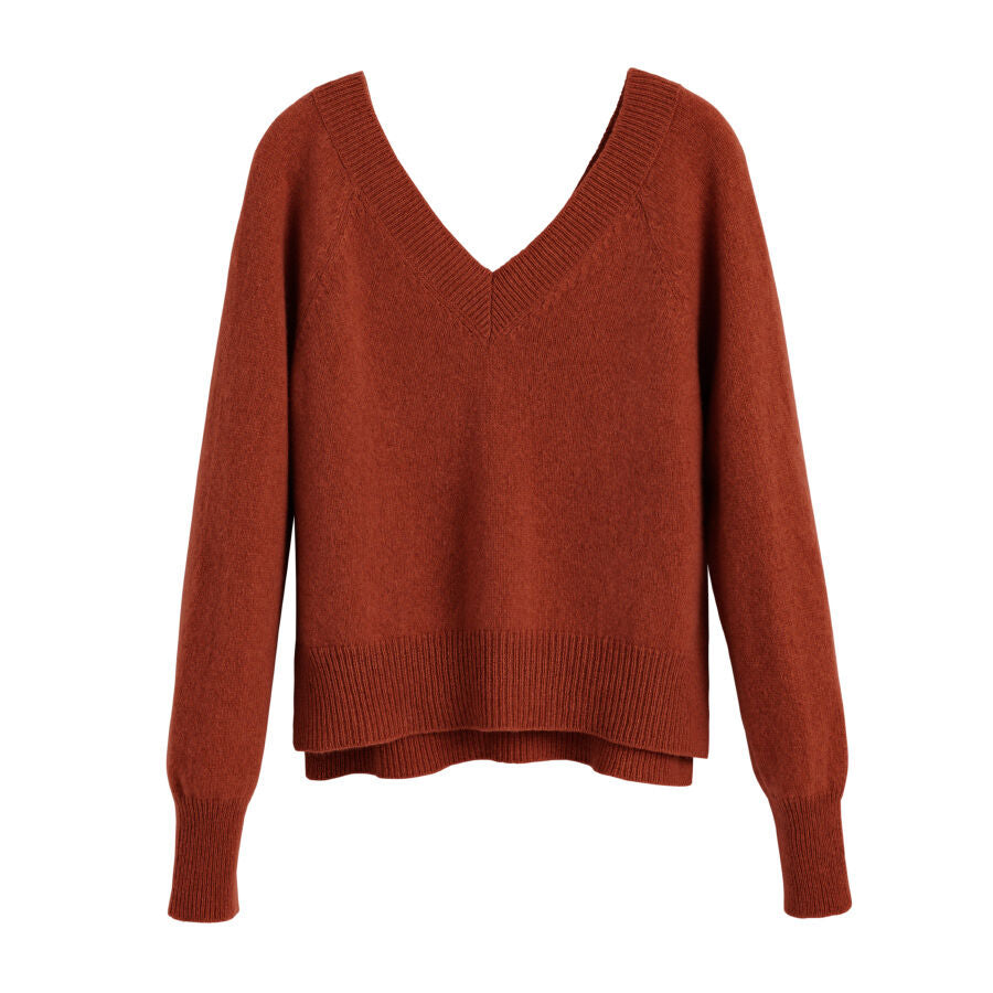 V-neck sweater isolated on a plain background