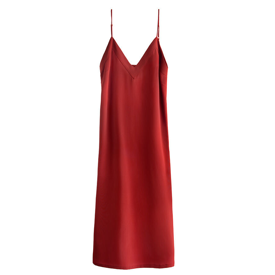 Sleeveless dress with thin straps and a V-neckline on a plain background.