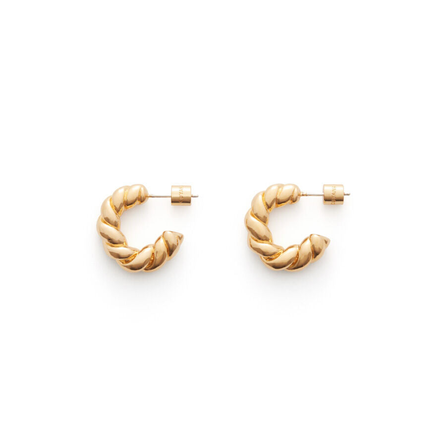 Two twisted hoop earrings on a white background.