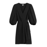 Black wrap dress with V-neck and three-quarter sleeves on white background.
