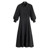 Long-sleeved dress with button detail and gathered waist.