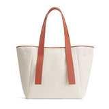 Large tote bag with two handles and a structured base.